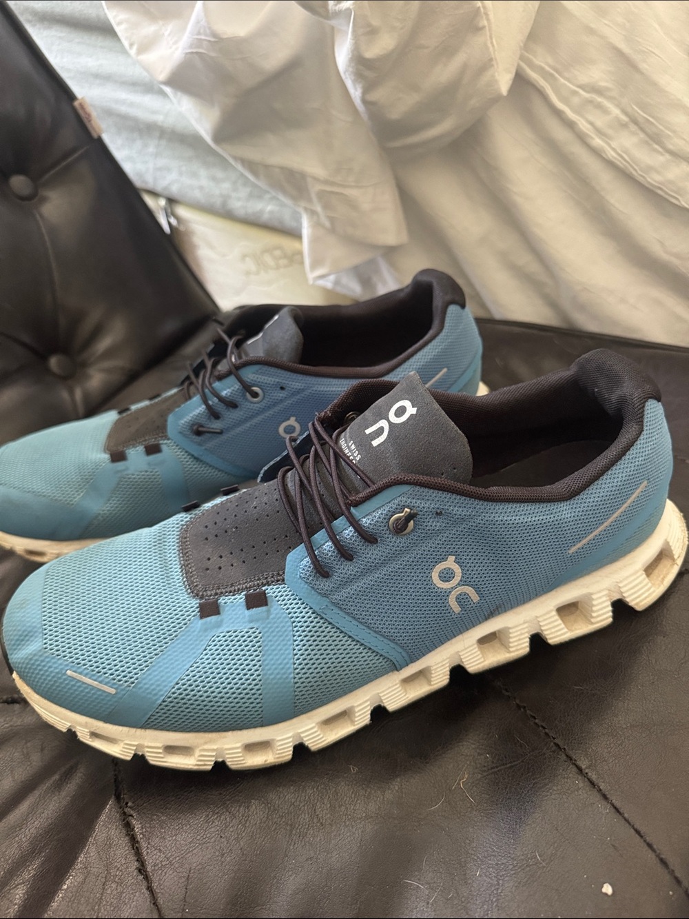On Running Men's Cloud Shoes in Light Blue with Black Accents